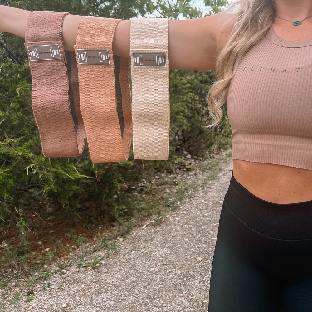 Set of Three Resistance Bands in Beige, Brown, and Tan